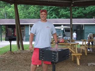 grilling at the outdoor kitchen